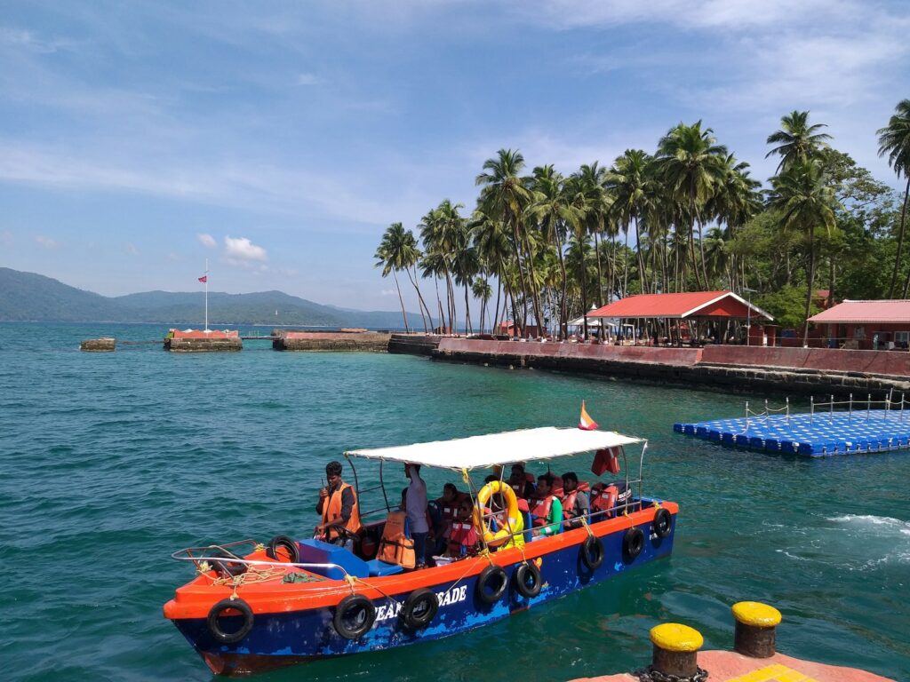 a group of people riding on top of a boat